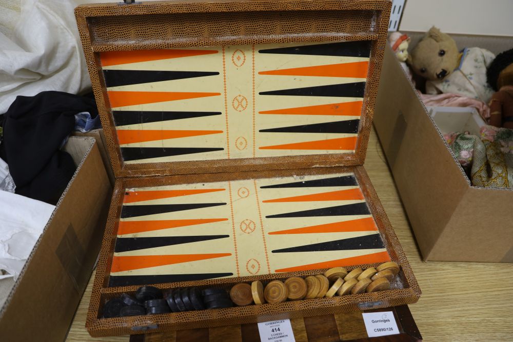 Three chess / backgammon boards and a few pieces
